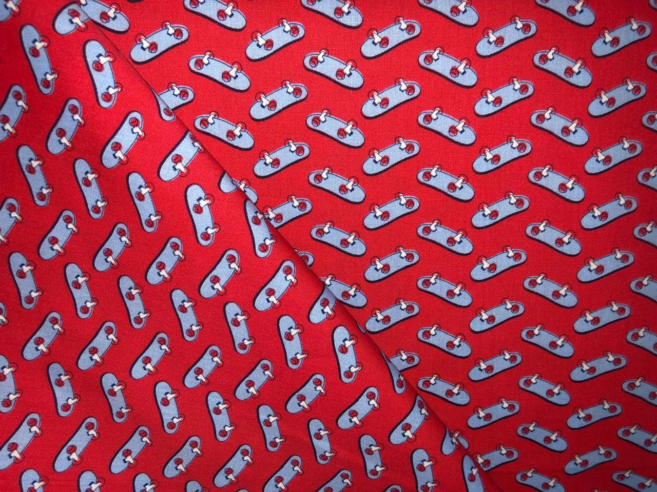 100% Cotton Poplin  Beach Prints 58" wide available in 4 prints red with blue skates/ bird bright orange flowers and the beach scene